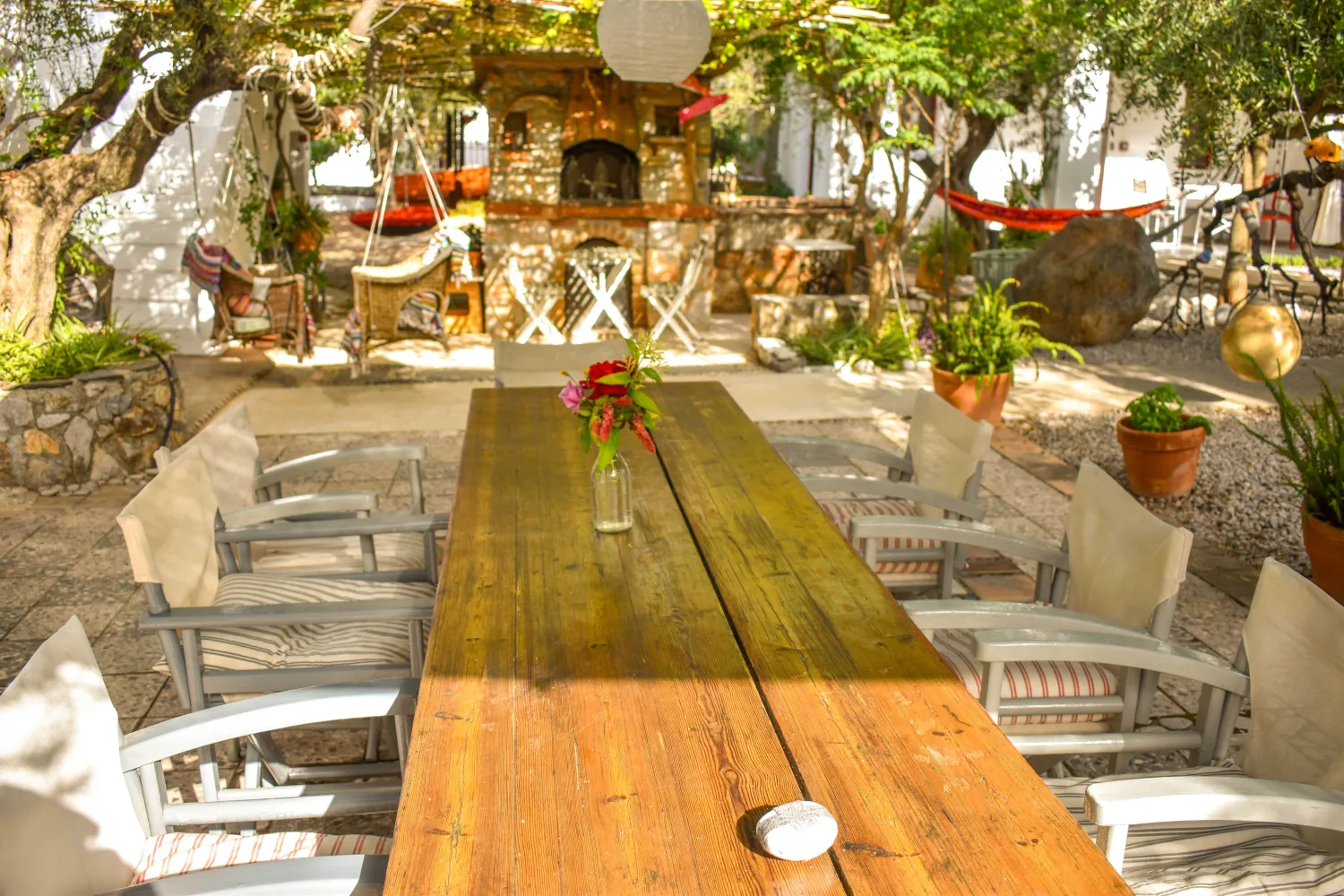 Breakfast table in a Greek courtyard
