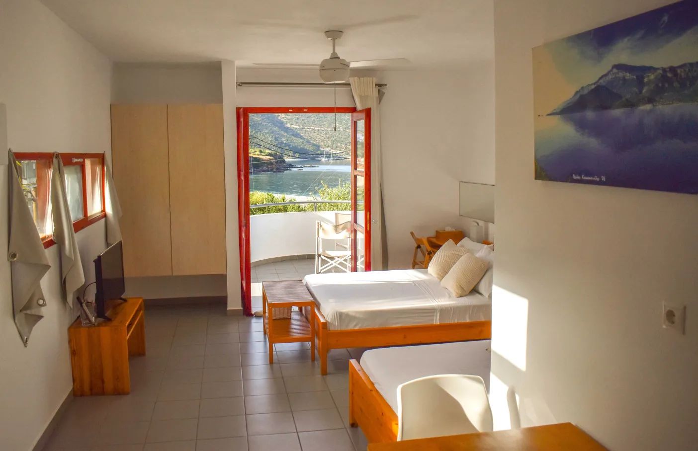 A bright, simple room at Kyfanta Hotel with sea view